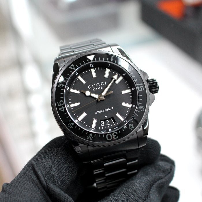  Shop Authentic Gucci Dive Quartz Black Dial Black Steel Strap Watch For Men - YA136205 - Luxxuri