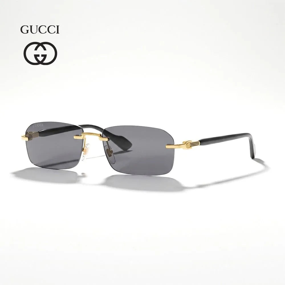 Gucci luxury sunglasses for men with grey lenses and gold-tone metal accents