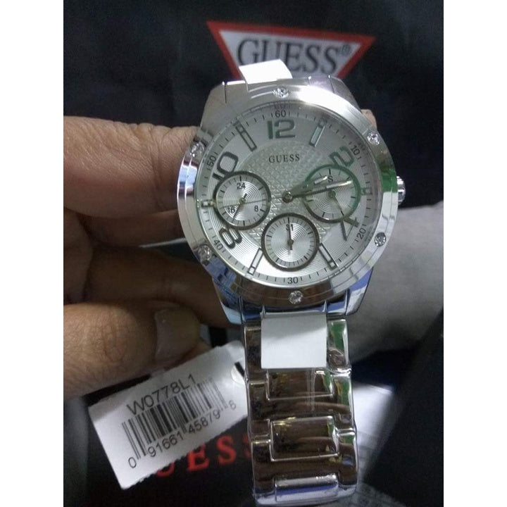 Guess Confetti Silver Dial Silver Steel Strap Watch for Women - W0778L1