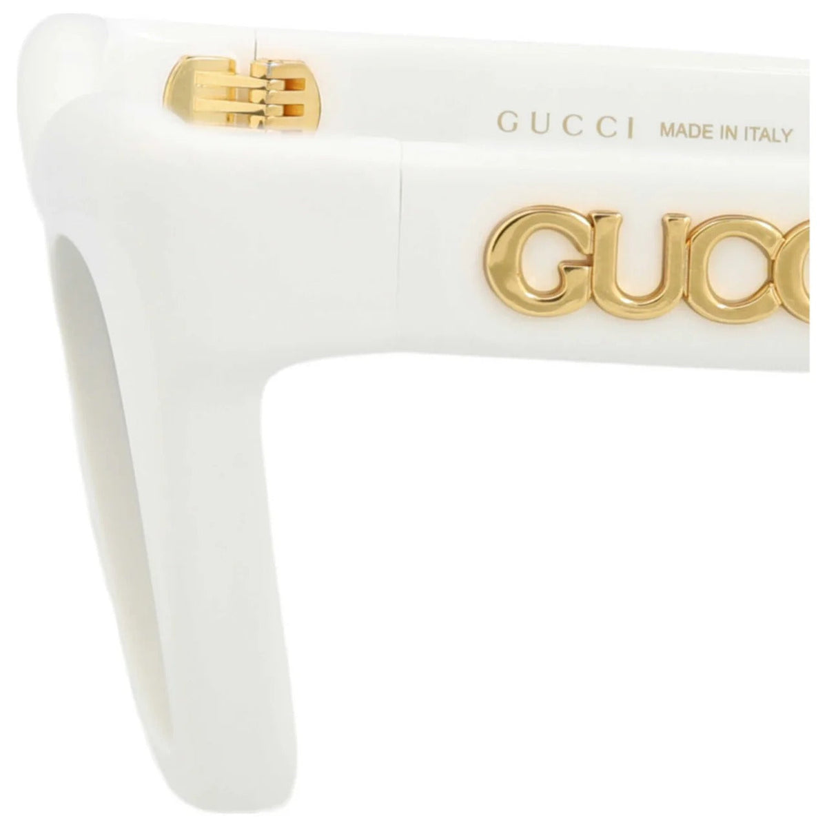 White luxury sunglasses with gold Gucci logo and metal hinge detail.